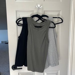 Athleta muscle tanks size large. Gray, black and gray! No tags